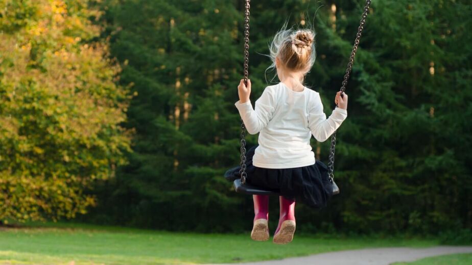 A young person sitting alone